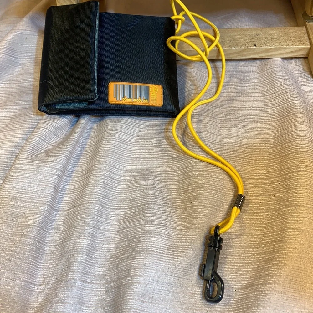 NWOT SurPlus foldable wallet w/bungee leash
